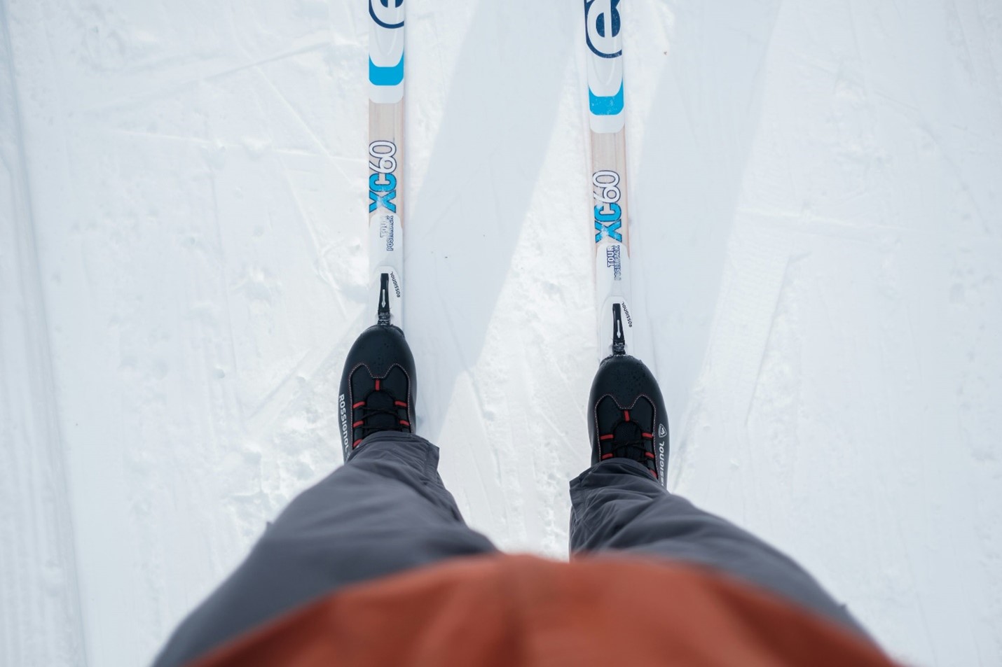 A first-person view of someone wearing skis.