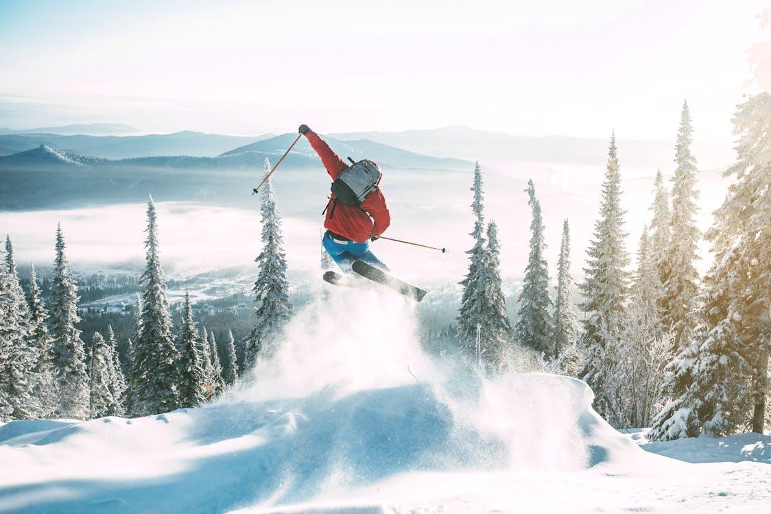 A skilled skier hitting the slopes.