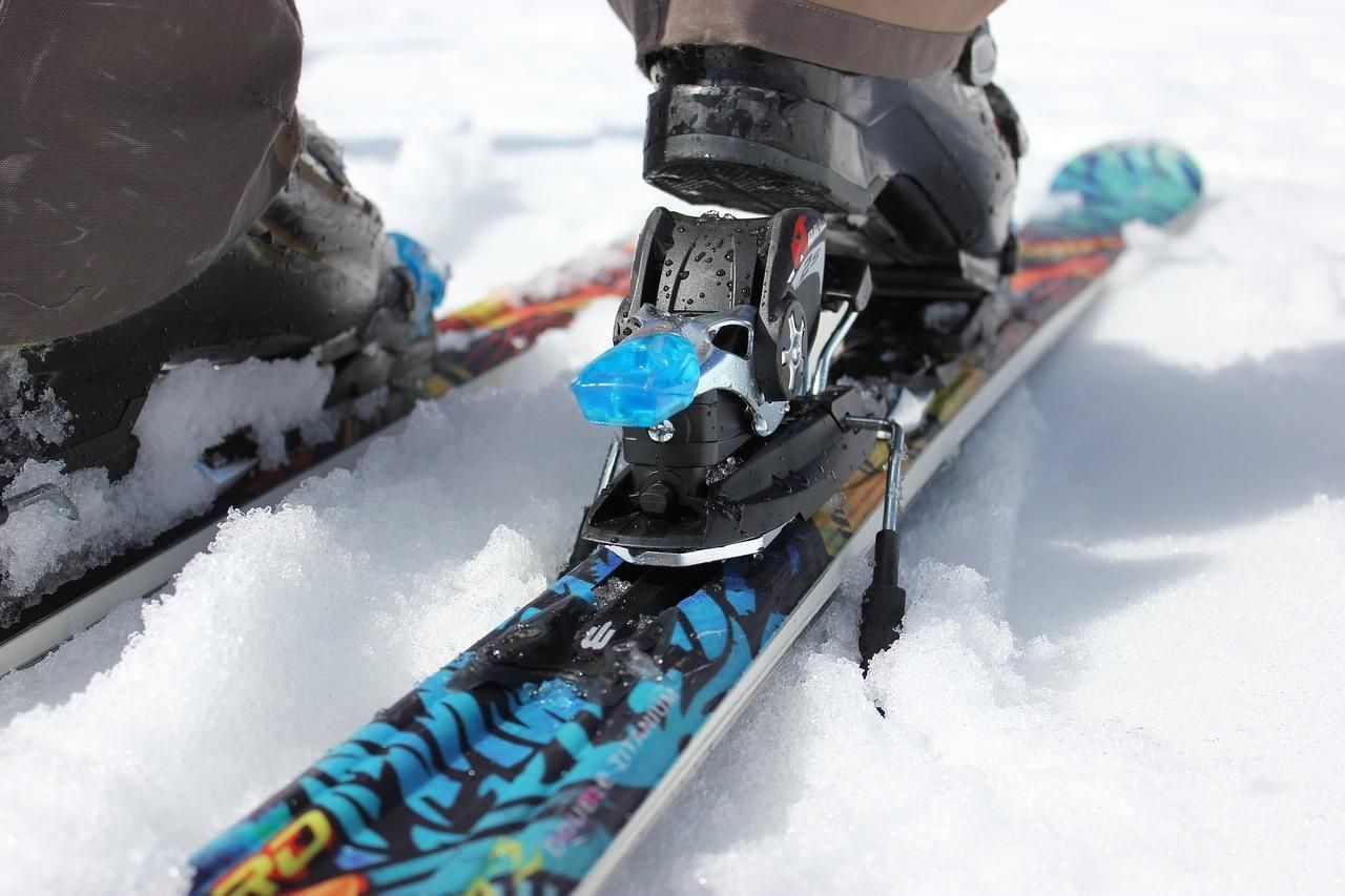 A close up of skis on snow.